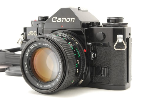 Read mint canon 35mm slr - canon,