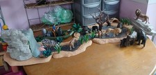 Schleich jungle clearing with extra animals and safari boat with driver