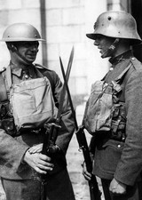 New helmets for Irish army left new American type helmet right old- Old Photo