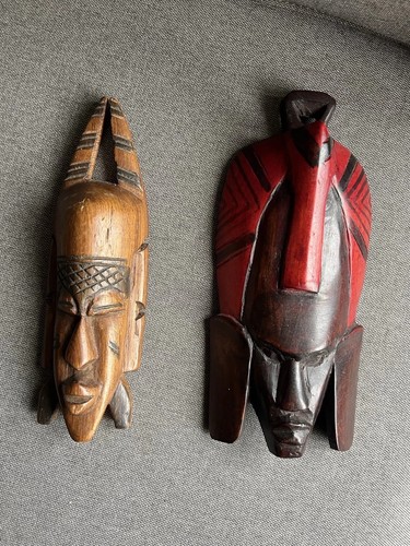Pair hand carved wooden - of,