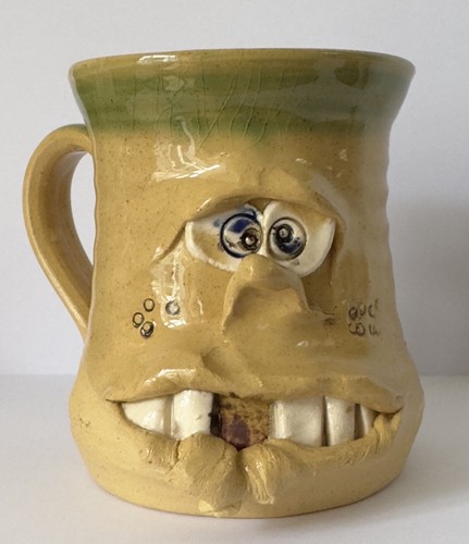 Pretty ugly hand thrown - ugly,