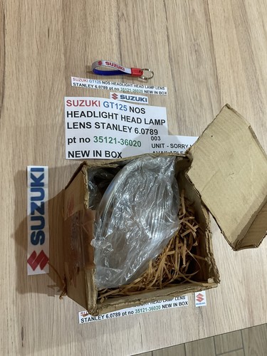 Suzuki gt125 nos headlight - suzuki,