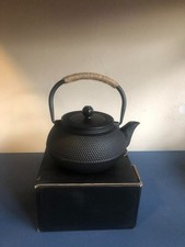 Cast Iron Kettle With Tea