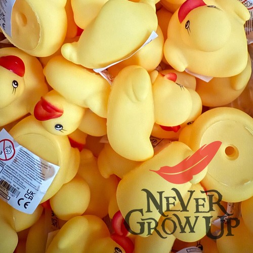 Yellow rubber bath ducks pool - bath,