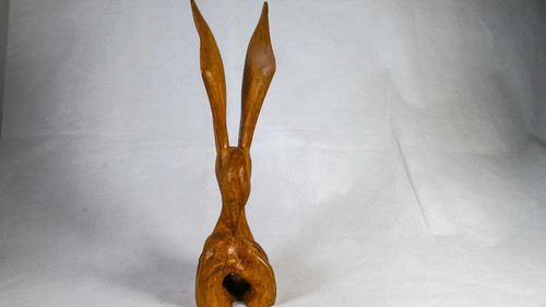 Hand carved bird - hand,