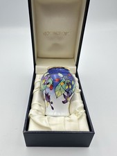 Boxed Moorcroft enamel vase in the 'Bittersweet' design