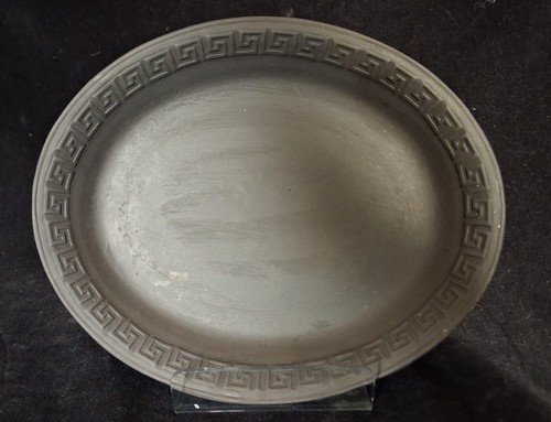 Antique black basalt oval