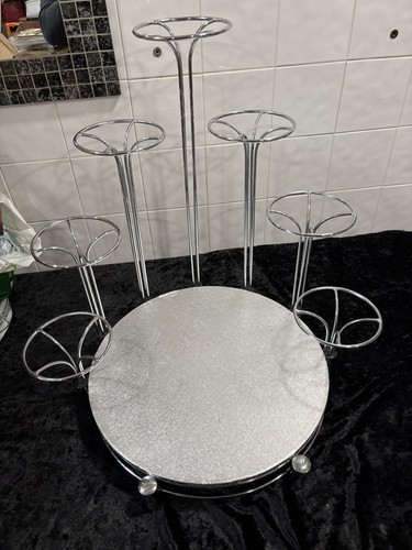 Tier chrome finish hand - tier,