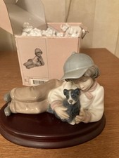 NAO Boy With Dog Figurine With