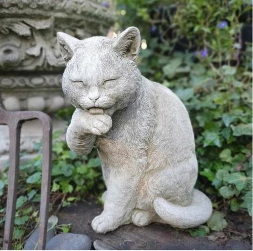 Preening cat statue - preening, |