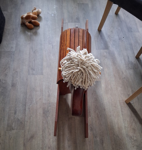 Wooden rocking horse with yarn - with,