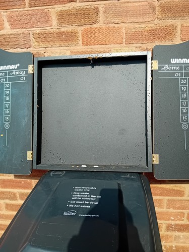 Used wooden dartboard - dartboard, casing