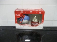 Enjoy coca cola snow globe and