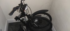 Muddy Fox Compact folding mountain bike.