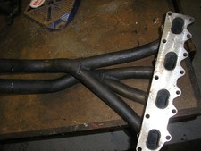Four branch exhaust manifold