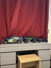 Traxxas Mini XRT 1/10 Scale,Subaru wr8 Flux 1/8 Scale Typhoon Grom 1/18 Scale.