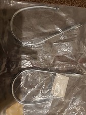 A Pair Of Chrome Curtain Holdbacks