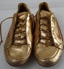 NIKE SHOX RIVALRY 314047-771 WOMANS US SIZE 8 GOLD METALLIC RED STRIP