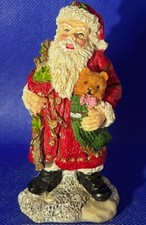 Santa with Puppy Dog Figurine