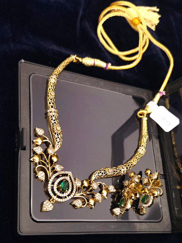 Gold tone green - gem, south