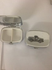 Morris Minor Pick Up ref162 pewter effect car emblem on a silver metal pill box