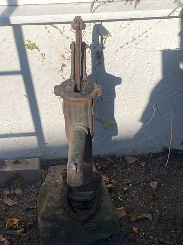 Vintage old cast - iron, pitcher