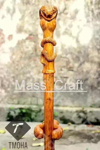 Hand carved snake head - hand,