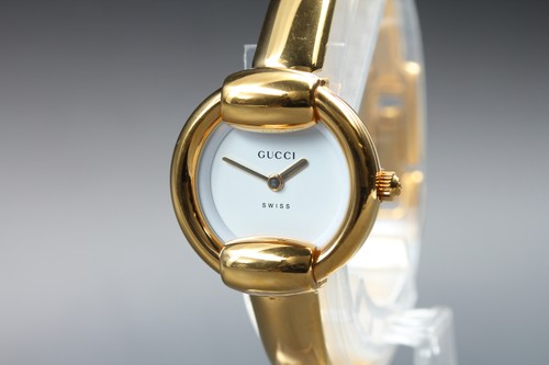 Near mint gucci - 1400l, gold