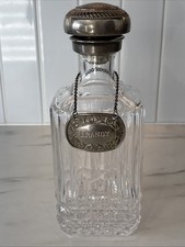 Vintage Of crystal decanters with silver-plated