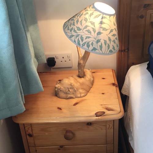 Wooden table lamp shape of - table, in