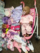 Baby Born Girl doll with buggy