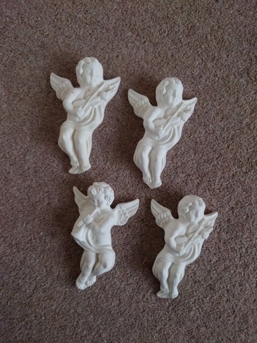 Plaster ornate cherub - x,