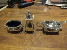 Garrard and co. Silver plate condiment set  and hallmarked spoon.