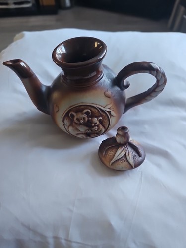 Swagman pottery piece with - pottery,