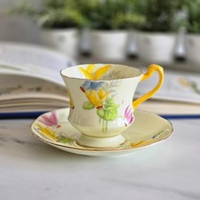 Paragon Yellow Cyclamen Tea Cup Saucer Duo Fine Bone China Made in England 