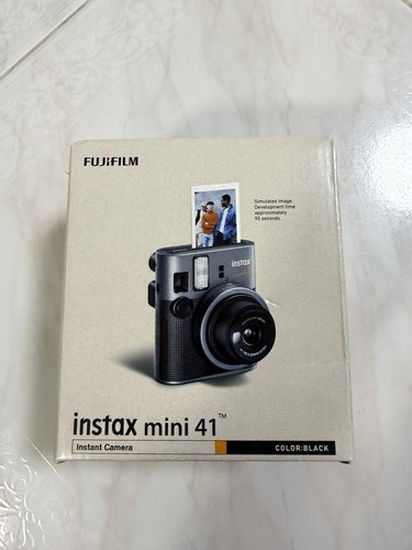 Brand new and sealed instax - and,