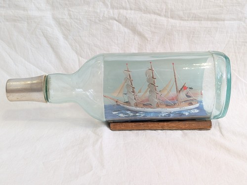 Vintage ship bottle - a, three