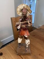 Mexican Paper Mache Figure carrying sticks
