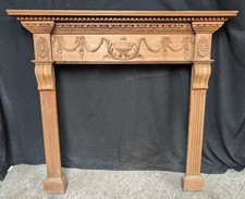 A RECLAIMED ADAM STYLE ANTIQUE PINE FIRE SURROUND CARVED DETAILING C.1920 FS0436
