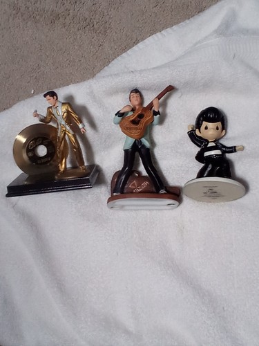Three elvis presley figurines - elvis,