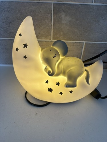 Large elephant over the - , moon