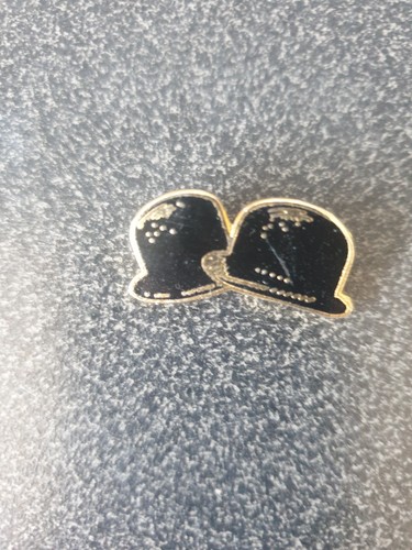 Laurel and hardy - and, badge