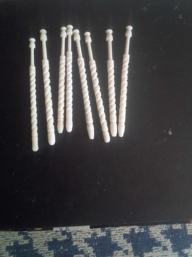 Eight spiral lace bobbins