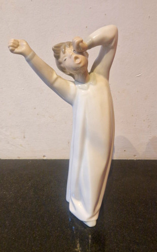 Lladro yawning boy figurine - boy,