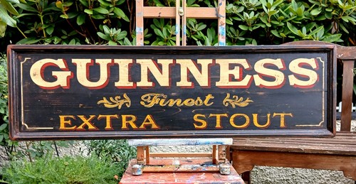 Hand made vintage guinness pub - hand,