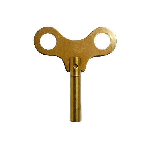New brass winding clock - /, key