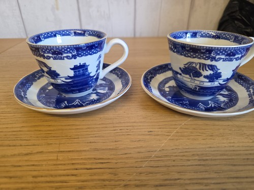 Pair vintage ringtons - a, of