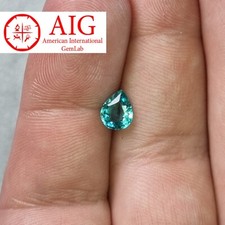 Apatite 0.93 ct , neon blue paraiba colour, 7.52x6.04x3.32mm AIG certificate