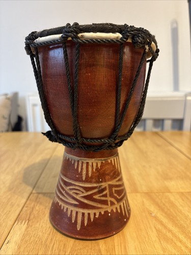 Hand crafted wooden bongo - crafted,