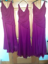 2 bridesmaids dresses and 1 mini bridesmaid. Wine colour. 